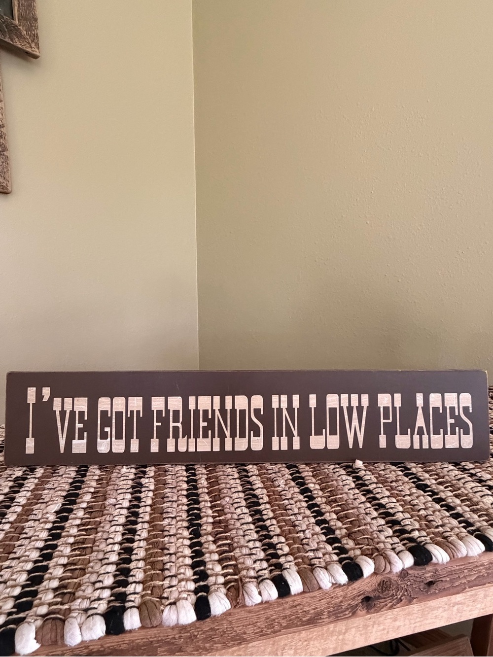 Brown Wooden Sign with White Lettering - "I've Got Friends in Low Places"